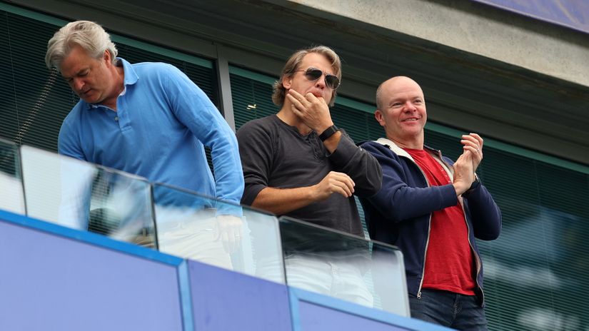 Todd Boehly (C), the buyer of Chelsea FC, celebrates a Blues goal at Stamford Bridge (©Catherine Ivill/Getty Images)