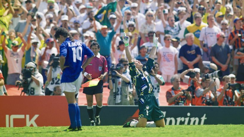 Brazil goalkeeper Taffarel celebrates after Roberto Baggio of Italy had missed his penalty to decide the FIFA World Cup Final 1994 (©Shaun Botterill/Allsport/Getty Images)