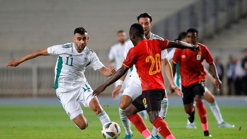 Algeria take on Uganda in their clash © CAF  