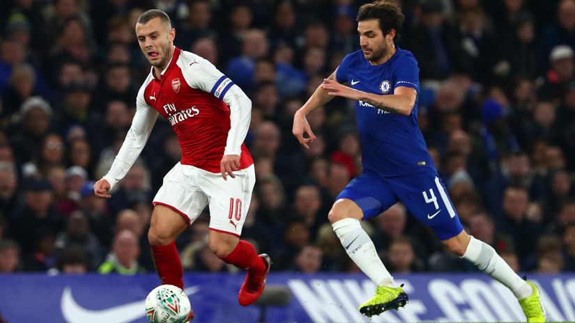 Wilshere against Sesc Fabregas of Chelsea back in 2018 (© Clive Rose/Getty Images)