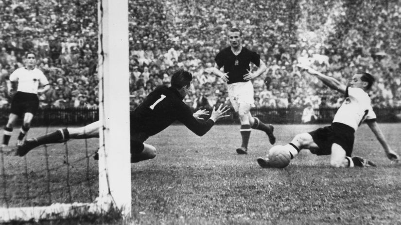 Max Morlock of West Germany scores his countries first goal of the match to get them back in the game during the FIFA World Cup Final against Hungary (©Allsport/Hulton)