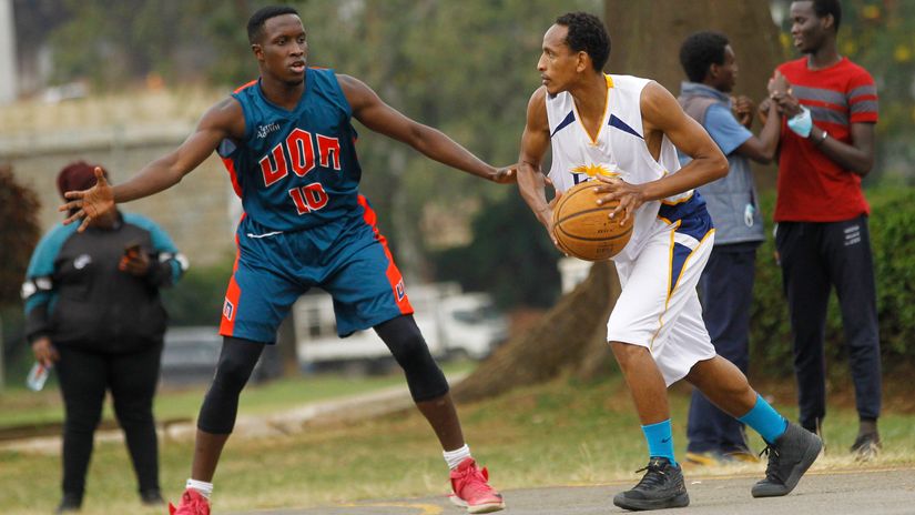 UoN's David Odanga (L) challenge KCA's Victor Murage in a past match 