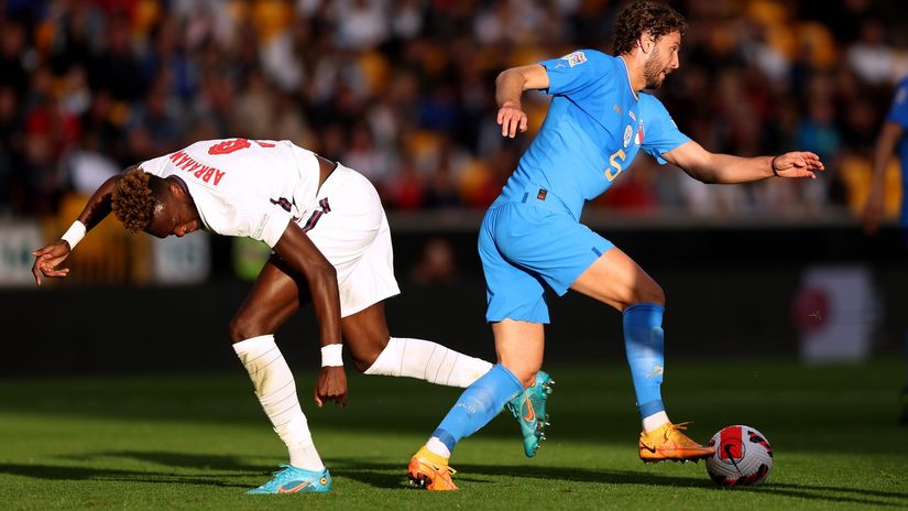 Locatelli takes the ball awat from Abraham (©Richard Heathcote/Getty Images)