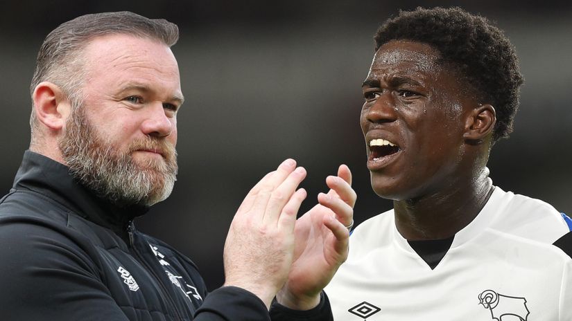 Wayne Rooney and Malcolm Ebiowei (©Getty Images)