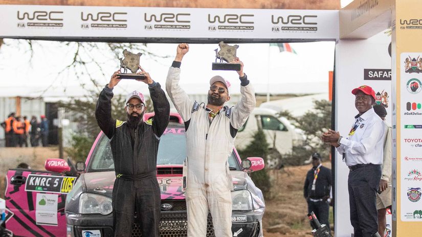 Zameer Verjee (Right) and his partner Zahir Shah hold their finishers' trophies aloft in Naivasha © Courtesy 