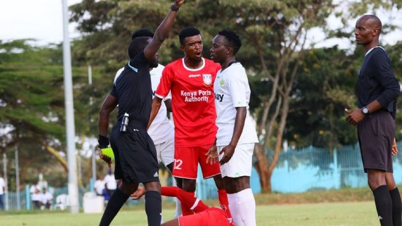 Peter Kamaku sends Stephen Otieno off for a bad tackle© courtesy