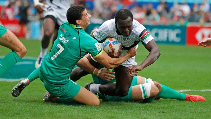 Kenya's Billy Odhiambo resists pressure from Ireland's Jordan Conroy © World Rugby