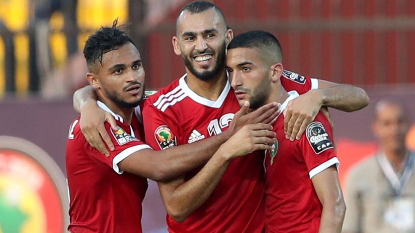 Ziyech celebrates with teammates (©REUTERS/Suhaib Salem)