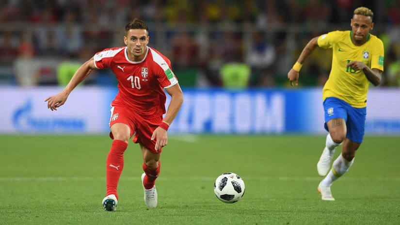 Dusan Tadic in action against Neymar at the 2018 FIFA World Cup (©Stu Forster/Getty Images))