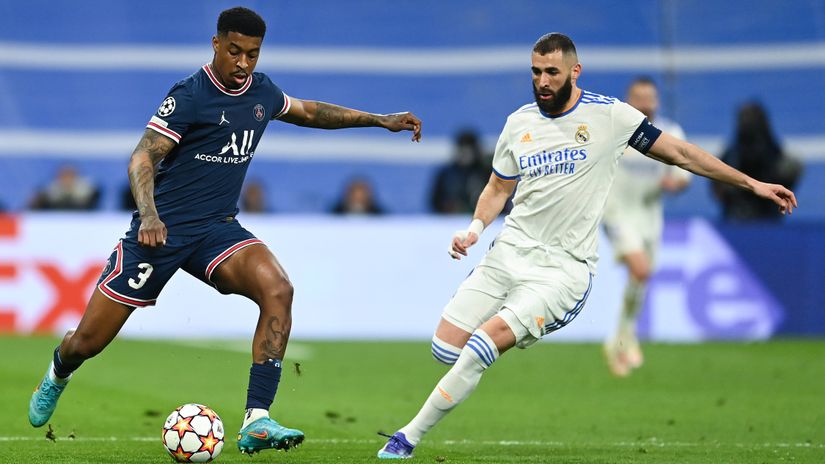 Kimpembe in action for PSG against Benzema of PSG (©David Ramos/Getty Images)