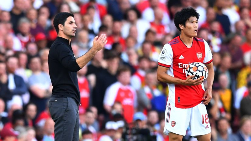 Arteta and Tomiyasu (©REUTERS/Dylan Martinez)