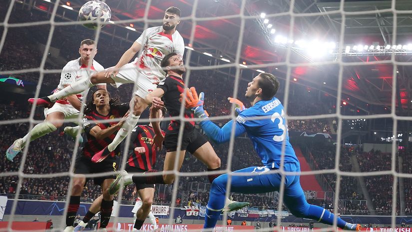 Josko Gvardiol of RB Leipzig scores the team's first goal past Ederson of Manchester City during the UEFA Champions League round of 16 leg one match between RB Leipzig and Manchester City (©Lars Baron/Getty Images)