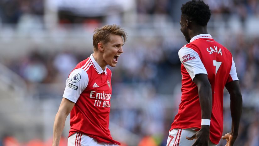 Odegaard celebrates with Saka (©Stu Forster/Getty Images)