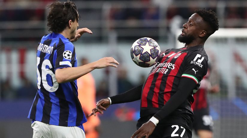 Origi collides with Darmian (©Marco Luzzani/Getty Images)