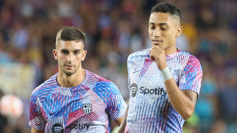 Ferran Torres and Raphinha (©AFP)