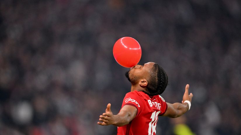 Christopher Nkunku celebrates after scoring the opener (©Sebastian Widmann/Getty Images)