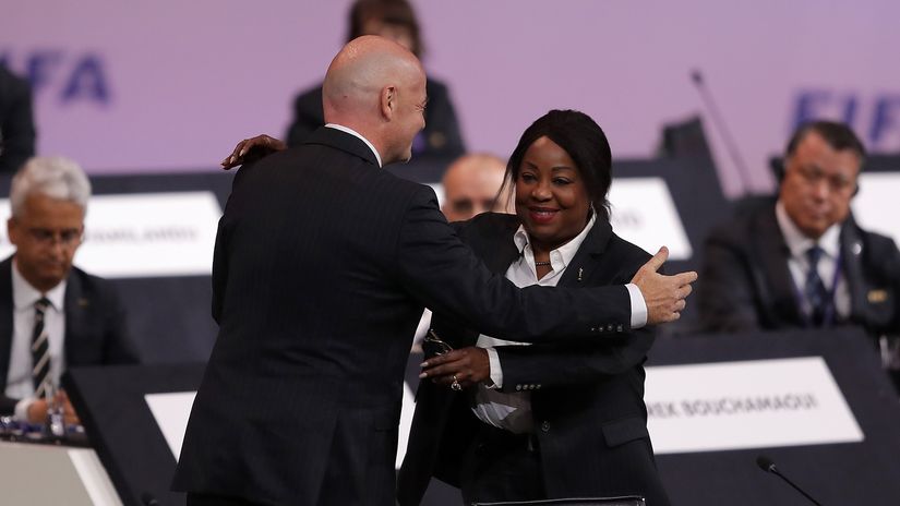 Fatma Samoura hugs Gianni Infantino (©Richard Heathcote/Getty Images)