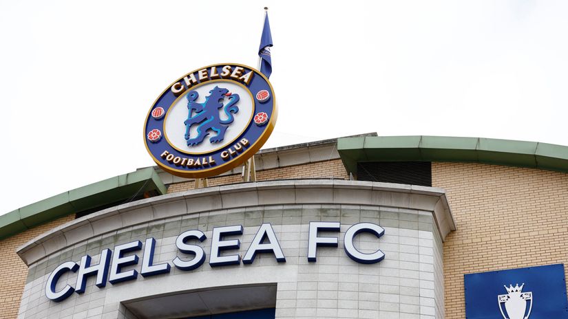 Some crossing Stamford Bridge towards Chelsea, some away from it