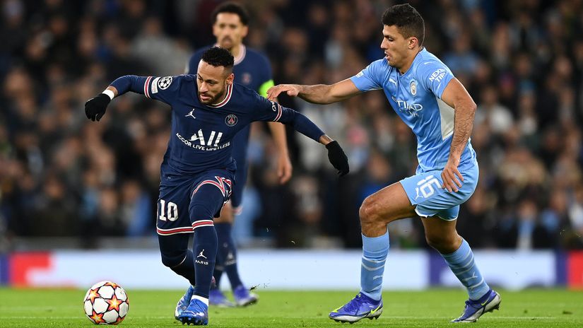 Neymar in action for PSG against Rodri of Manchester City (©Shaun Botterill/Getty Images)