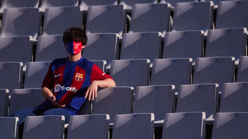 A Barca fan sits alone in the stands (©Eric Alonso/Getty Images)