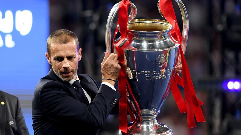 UEFA president Ceferin with the UCL trophy (©Matthias Hangst/Getty Images)