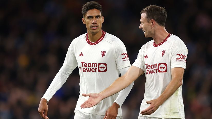 Raphael Varane and Jonny Evans (©Matt McNulty/Getty Images)