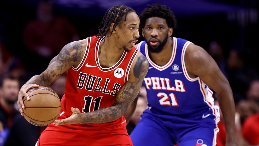 DeMar DeRozen and Joel Embiid (AFP)