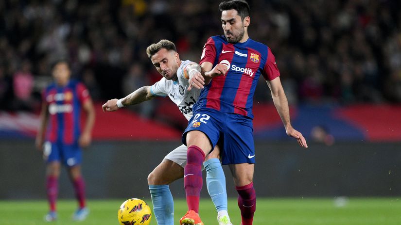 Garcia fights for the ball with Gundogan recently (©David Ramos/Getty Images)