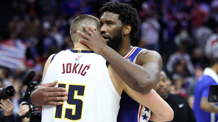 Jokic and Embiid hugging after the game (©Tim Nwachukwu/Getty Images)