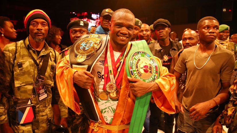 Rayton Okwiri of Kenya celebrates being crowned the champion after defeating Chikodi Makawa of Malawi on 9 September 2023 ©Mozzart Sport/SportPicha