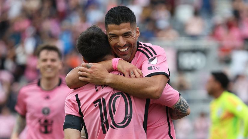 Luis Suarez and Lionel Messi (©AFP)