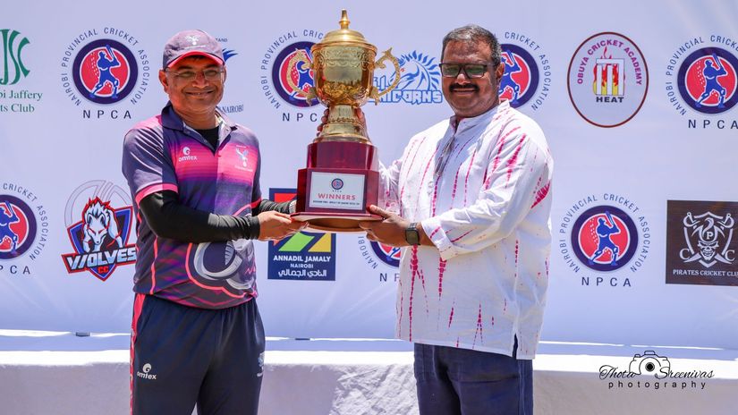 Ngara Sports Club B Captain Piyushkumar Patel receives Division 2 Floating Trophy©NPCA