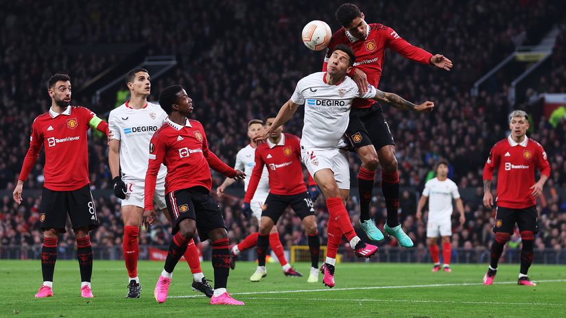 Varane heading the ball against Sevilla (©Catherine Ivill/Getty Images)