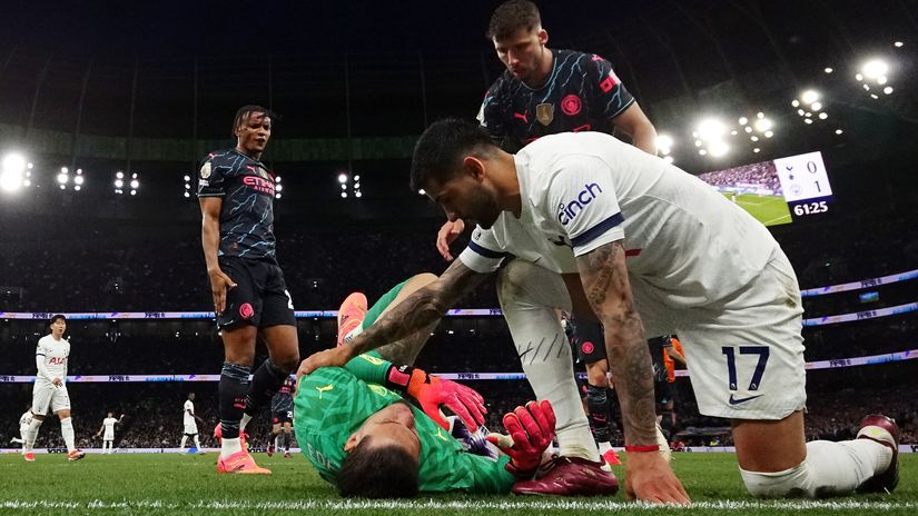 Romero of Tottenham checks on Ederson after the collision (©Justin Setterfield/Getty Images)
