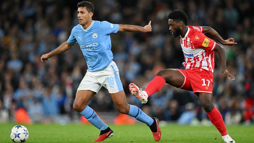Krasso in action for Red Star against Manchester City's Rodri in the Champions League (©Shaun Botterill/Getty Images)