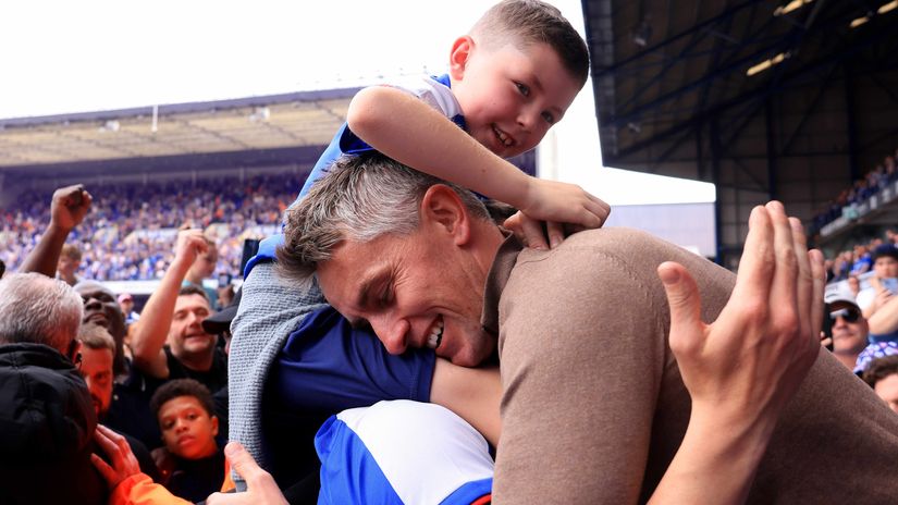 Kieran McKenna celebrates promotion to the Premier League with Ipswich fans (©Stephen Pond/Getty Images)