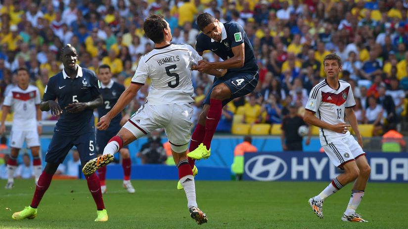 Hummels and Varane in action against each other during the 2014 FIFA World Cup (©Matthias Hangst/Getty Images)