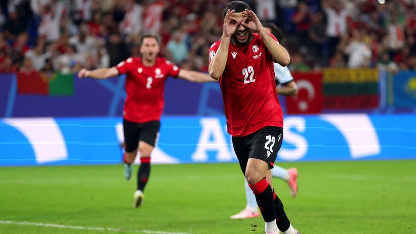Mikautadze celebrates after scoring for Georgia in the Euros (©Lars Baron/Getty Images)