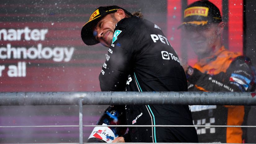 Lewis Hamilton celebrates a victory (©Rudy Carezzevoli/Getty Images)