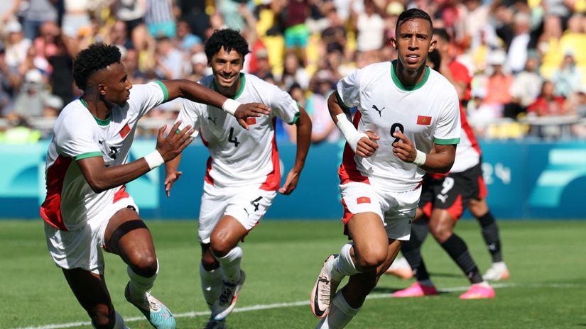 The Moroccans celebrate Rahimi's goal(©AFP)