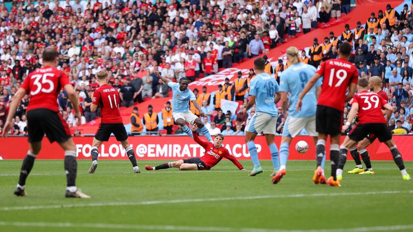 Doku fires against Manchester United in the FA Cup final (©Alex Pantling/Getty Images)