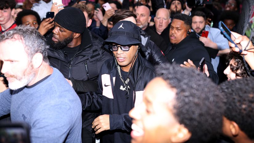 Ronaldinho with his entourage and bodyguards (©Charlie Crowhurst/Getty Images For Nike)
