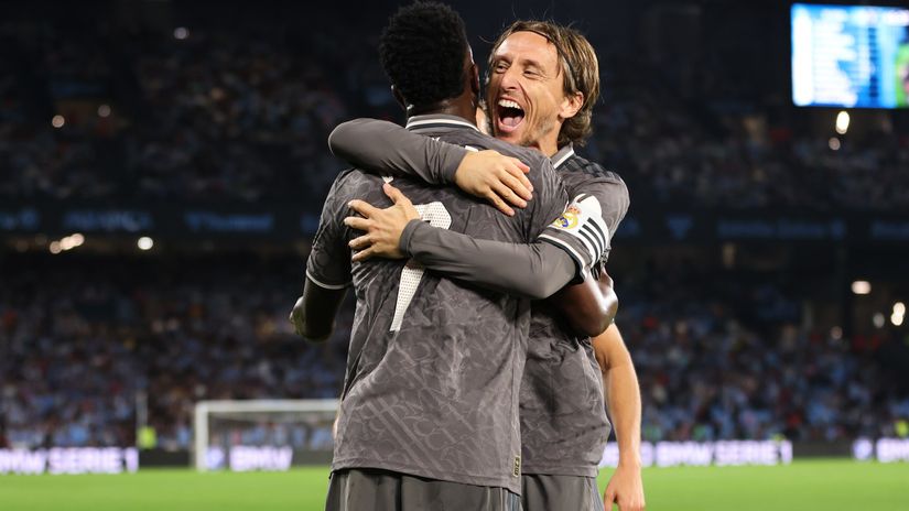 Modric and Vini celebrate the winning goal (©Florencia Tan Jun/Getty Images)
