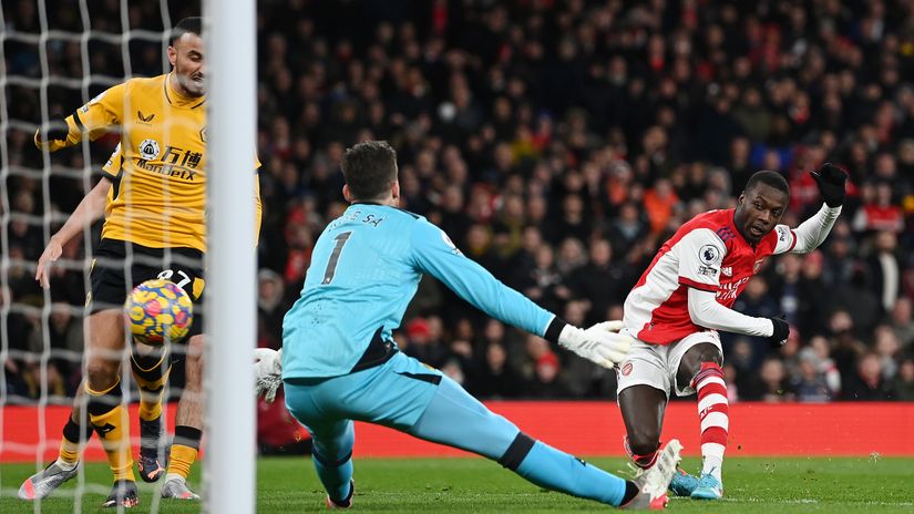 Pepe scores for Arsenal against Wolves in 2022 (©Shaun Botterill/Getty Images)