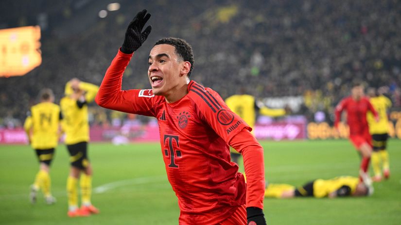 Musiala celebrates his late equalizer while BVB's player cannot believe (in the background)(©Stuart Franklin/Getty Images)