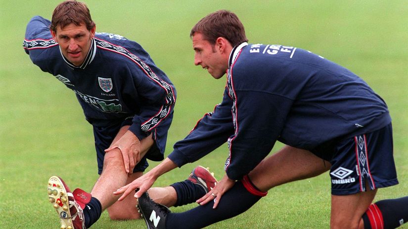 Adams and Southgate stretch during a practice (©Darren Walsh/Action Images/Reuters)
