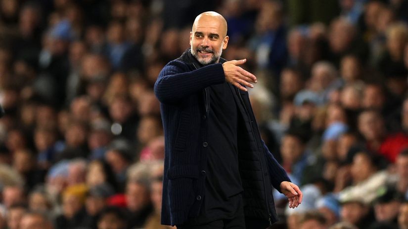 Pep's "plastic smile"(©Carl Recine/Getty Images)