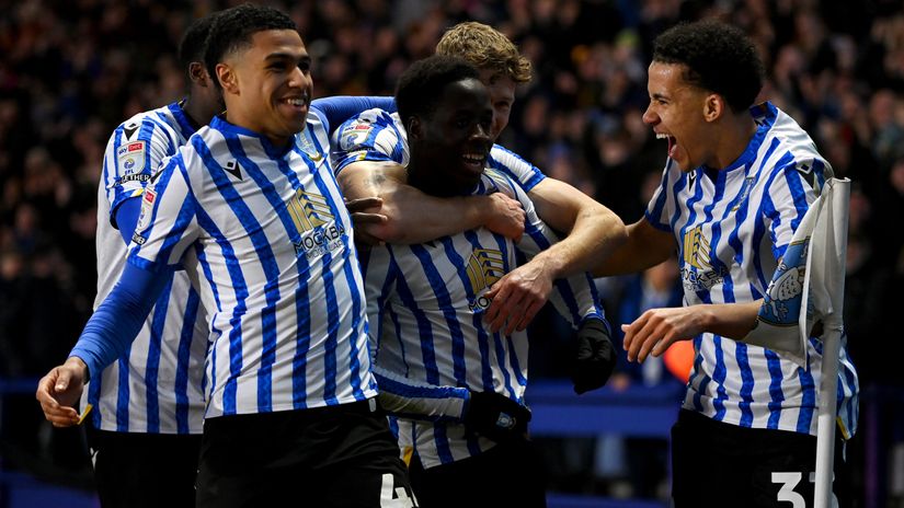 Sheffield Wednesday players celebrate after scoring against Derby (©Gareth Copley/Getty Images)
