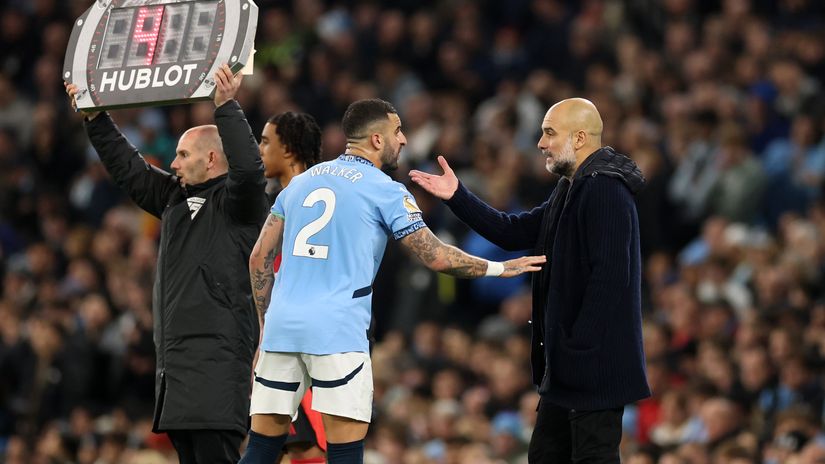 Kyle Walker and Pep Guardiola (©Carl Recine/Getty Images))
