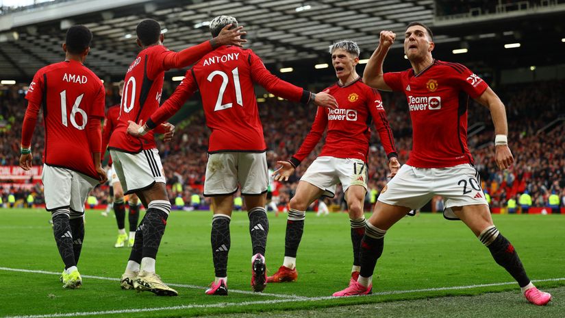 United players celebrating (©Reuters/Gallo Images))